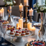 Elegant table setting with lit candles, floral arrangements, and assorted desserts, including layered cakes and a decorated tart.