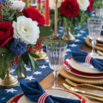 Festive table setting with red, white, and blue decor, including flowers and candles, on a star-patterned tablecloth.