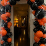 Create a Dramatic Black and Orange Balloon Arch
