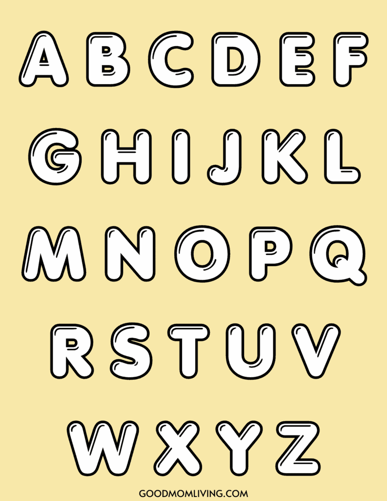 Bold, outlined black letters of the alphabet (A-Z) arranged in four rows on a yellow background, with the text 'GOODMOMLIVING.COM' at the bottom.