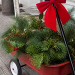 Classic Red Wagon Filled with Fresh Evergreens
